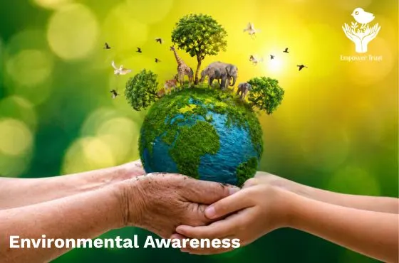 Hands holding Earth with trees and animals, symbolizing environment awareness.